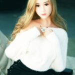 Pupa tas-sess abjad femminili Amerikana grata